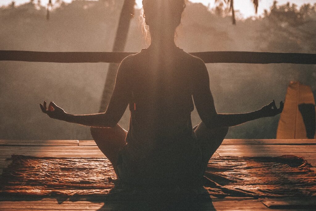How to Set Fitness Goals That Actually Stick Person meditating and setting fitness goals before a training session in Sydney