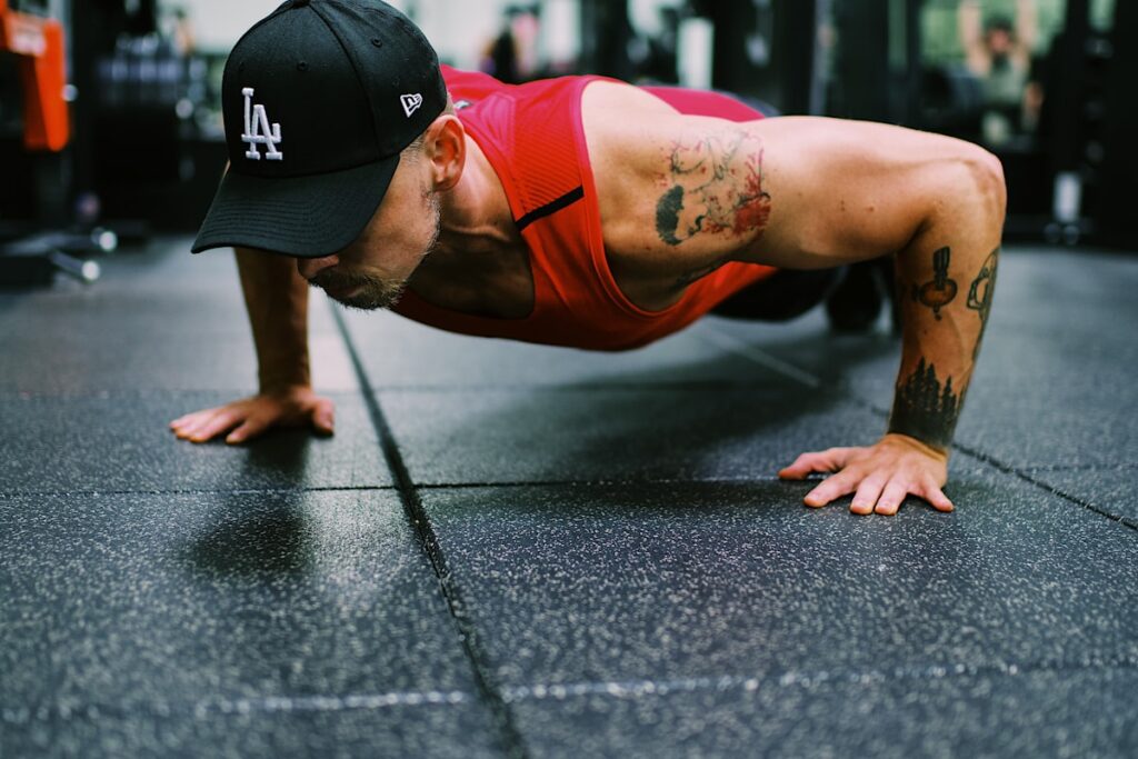 Man doing push-ups with proper form during outdoor personal training session in Sydney